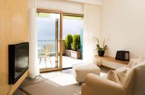 Wohnbereich Deluxe Suite mit Terrasse und Seesicht