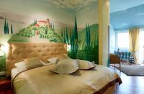 Das Themenzimmer Toskana mit 28 m² Wohnfläche und Wintergarten (Kategorie Superior)